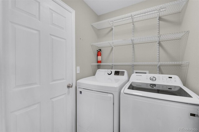 3456 Osprey Ridge Dr, Colorado Springs, CO 80916 - laundry area with washer and clothes dryer