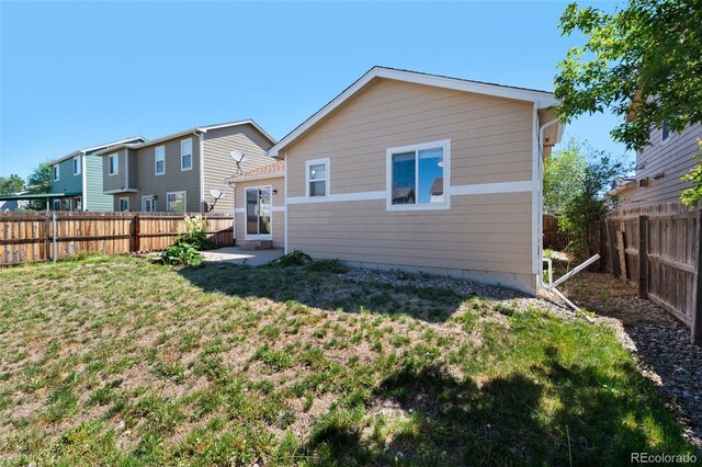 3456 Osprey Ridge Dr, Colorado Springs, CO 80916 - back of property featuring a patio