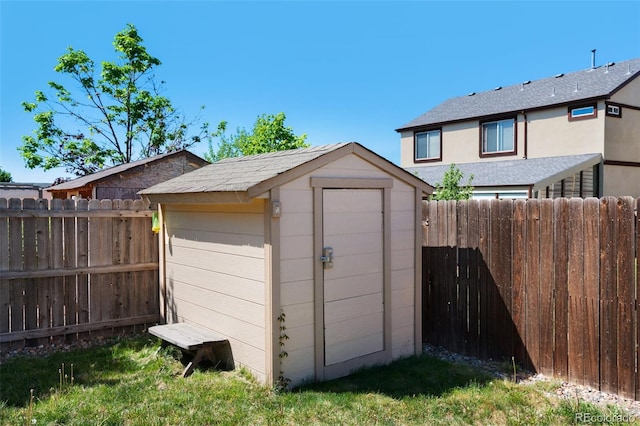 3456 Osprey Ridge Dr, Colorado Springs, CO 80916 - view of shed featuring a fenced backyard