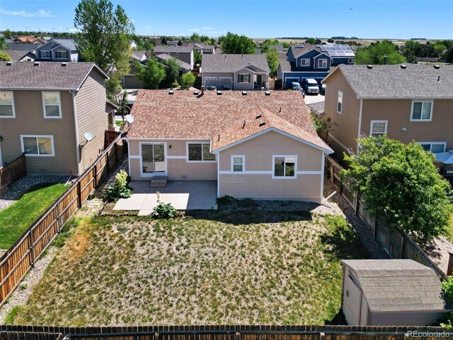 3456 Osprey Ridge Dr, Colorado Springs, CO 80916 - rear view of house with a residential view and a patio