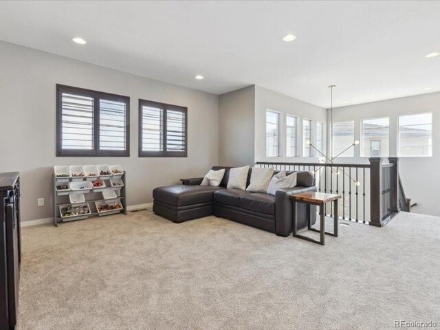11426 Box Turtle Ct, Parker, CO 80134 - living area featuring healthy amount of natural light, carpet, recessed lighting, and baseboards