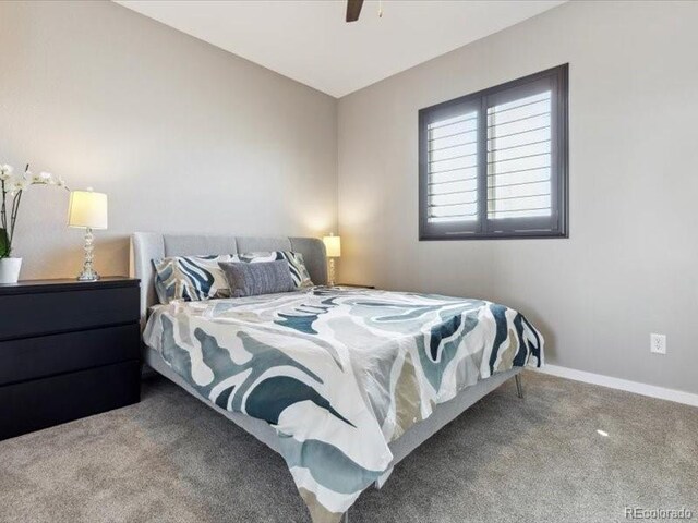 11426 Box Turtle Ct, Parker, CO 80134 - carpeted bedroom with baseboards and a ceiling fan