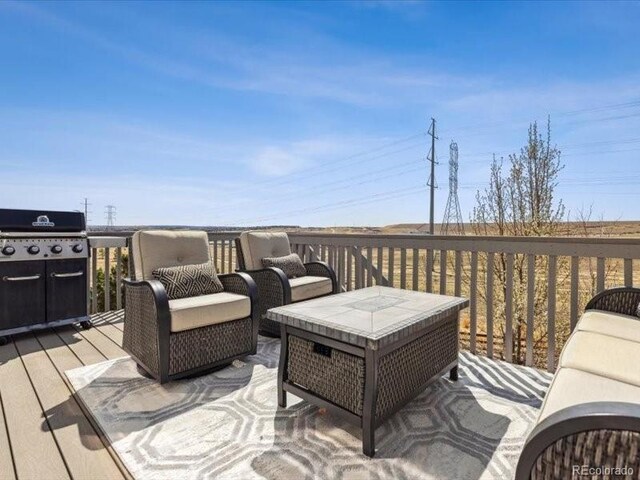 11426 Box Turtle Ct, Parker, CO 80134 - wooden terrace with area for grilling