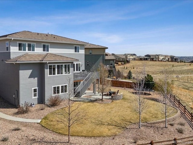 11426 Box Turtle Ct, Parker, CO 80134 - rear view of property with stairs, a wooden deck, an outdoor fire pit, and a patio area