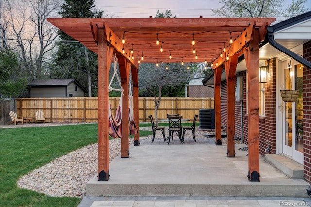 3130 S Krameria St, Denver, CO 80222 - fenced backyard with a pergola, a patio area, and outdoor dining area