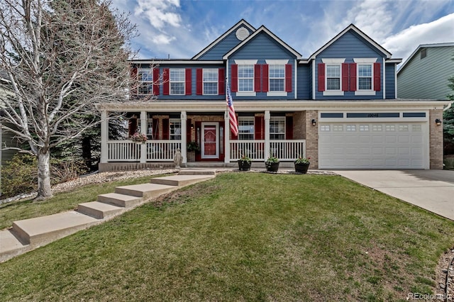 view of front facade featuring a porch, an attached garage, a front yard, and concrete driveway