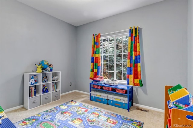 game room featuring carpet floors and baseboards