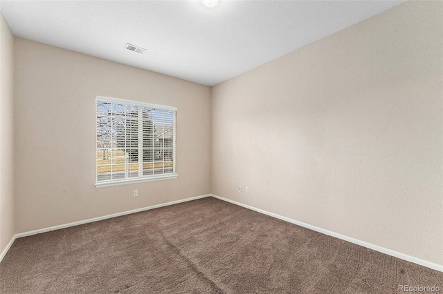 view of carpeted spare room