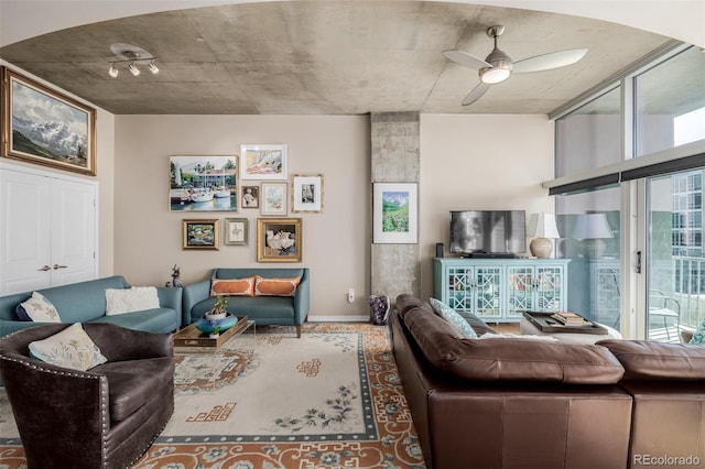1700 Bassett St Unit 513, Denver, CO 80202 - living area featuring a ceiling fan and baseboards