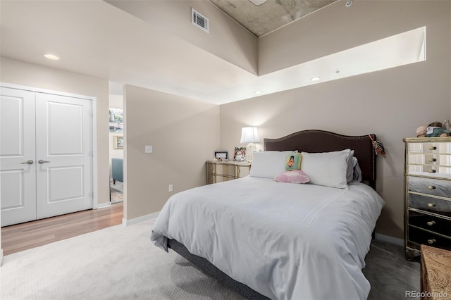 1700 Bassett St Unit 513, Denver, CO 80202 - bedroom featuring carpet, baseboards, and a closet