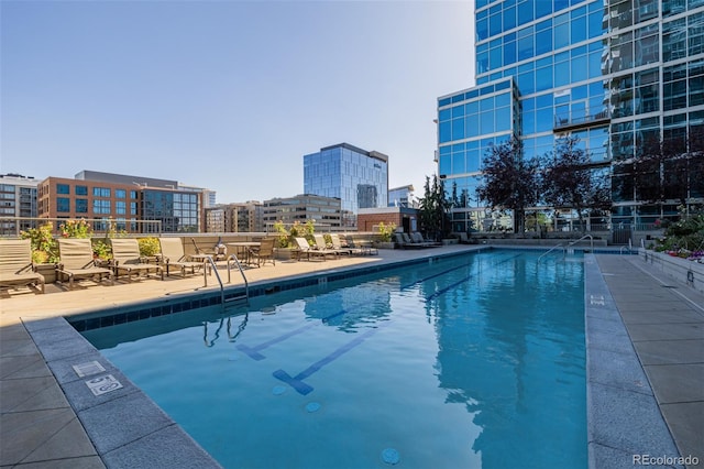 1700 Bassett St Unit 513, Denver, CO 80202 - community pool with a view of city and a patio