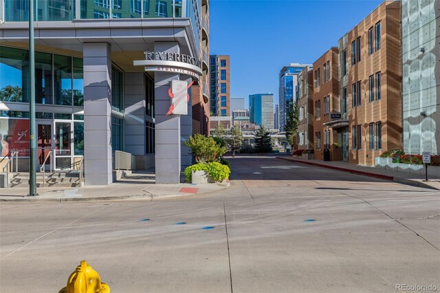 1700 Bassett St Unit 513, Denver, CO 80202 - view of road featuring curbs, a view of city, and sidewalks