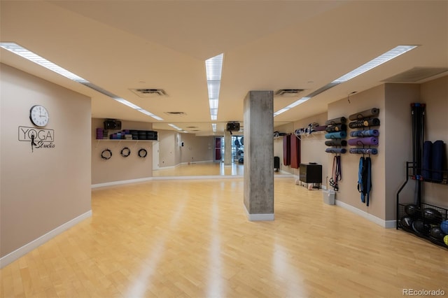 1700 Bassett St Unit 513, Denver, CO 80202 - workout area with baseboards and light wood-type flooring