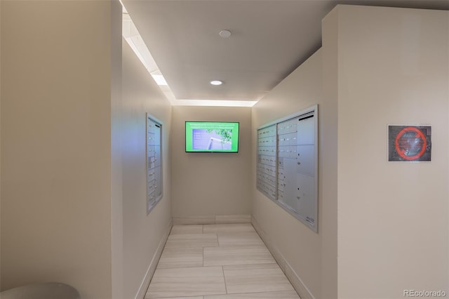 1700 Bassett St Unit 513, Denver, CO 80202 - corridor with mail area, baseboards, and recessed lighting
