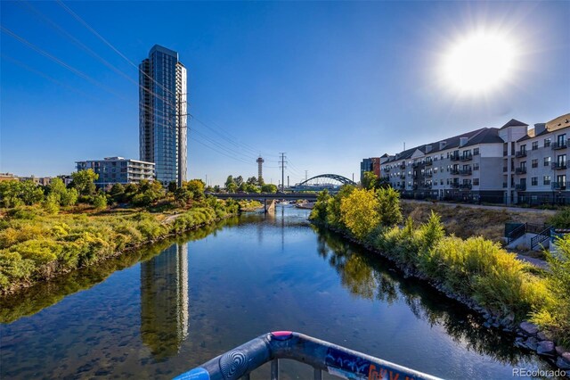1700 Bassett St Unit 513, Denver, CO 80202 - water view with a notable bridge
