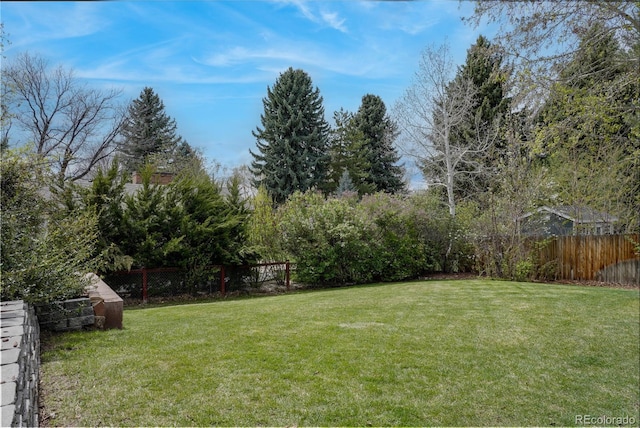 view of yard with fence