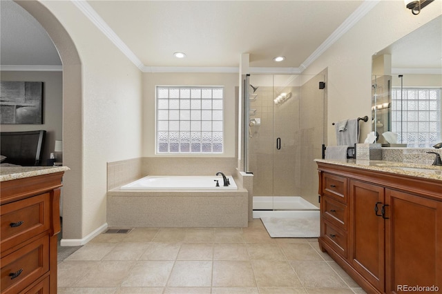 bathroom featuring crown molding, tile patterned floors, vanity, and shower with separate bathtub