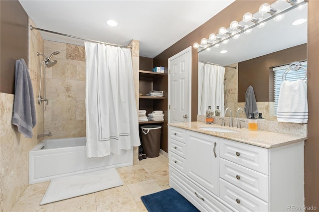 bathroom featuring vanity and shower / bath combo with shower curtain