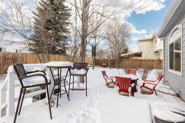 view of snow covered patio