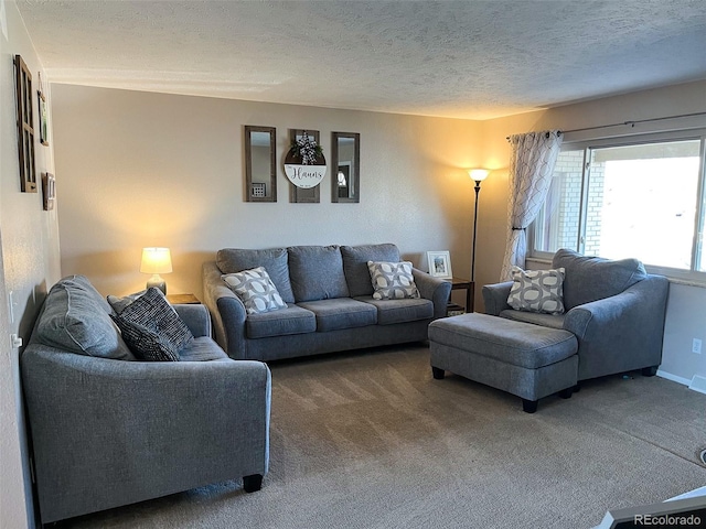 living area featuring a textured ceiling, carpet flooring, visible vents, and baseboards