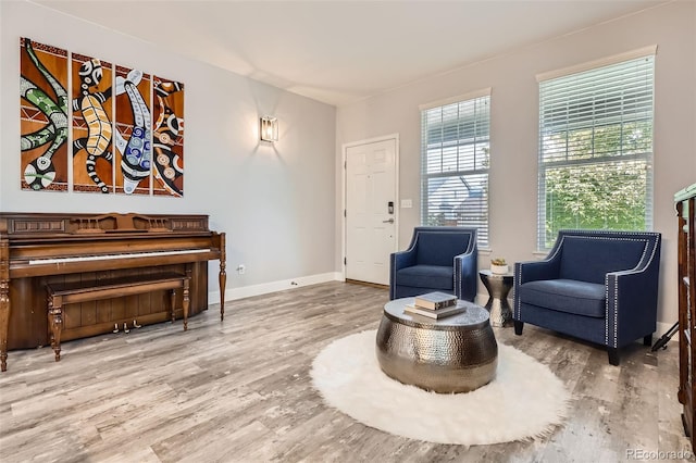 8317 Liverpool Cir, Littleton, CO 80125 - sitting room featuring wood finished floors and baseboards