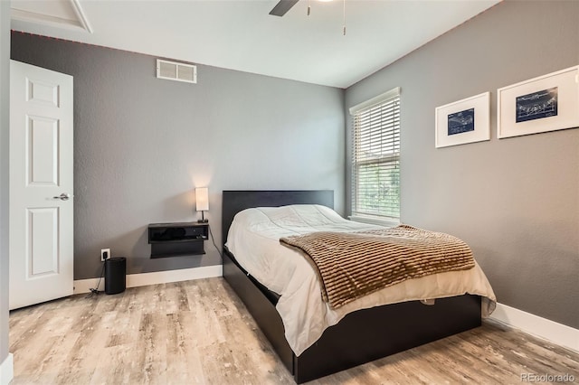 8317 Liverpool Cir, Littleton, CO 80125 - bedroom with wood finished floors, baseboards, and ceiling fan
