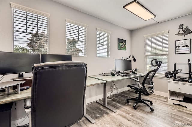 8317 Liverpool Cir, Littleton, CO 80125 - office with wood finished floors and baseboards