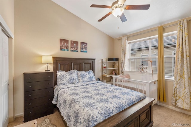 5800 Tower Rd Unit 610, Denver, CO 80249 - bedroom featuring light carpet, lofted ceiling, a closet, and a ceiling fan