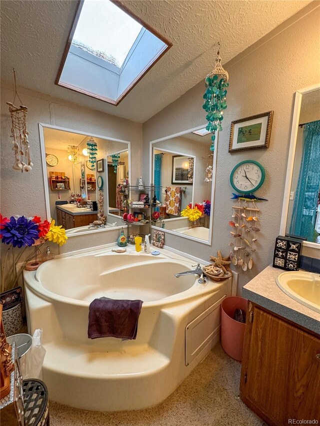 312 Ceratosaurus Cir, Dinosaur, CO 81610 - bathroom featuring a textured ceiling, a bath, vanity, and a textured wall