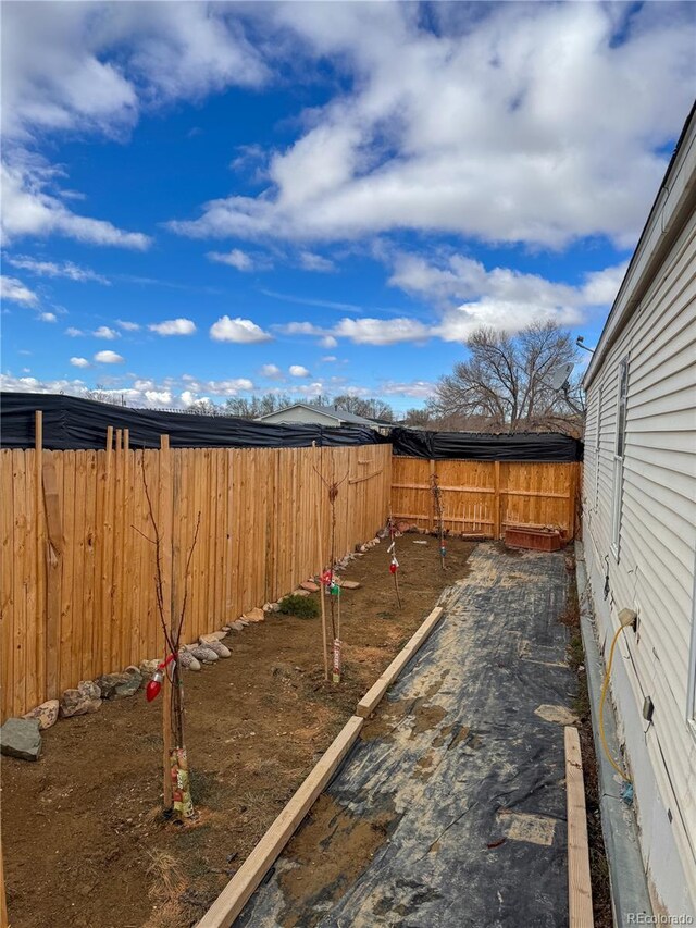 312 Ceratosaurus Cir, Dinosaur, CO 81610 - view of yard featuring a fenced backyard