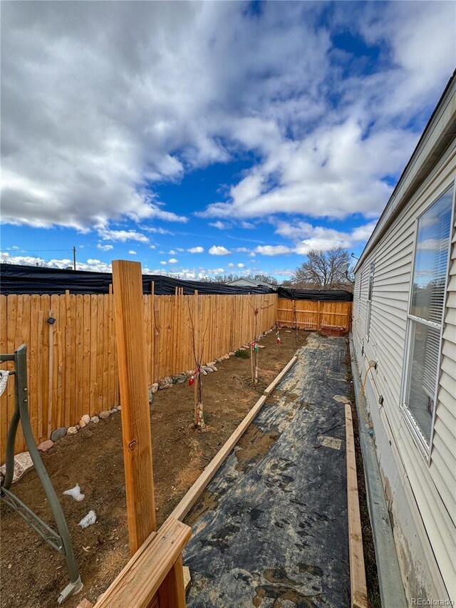312 Ceratosaurus Cir, Dinosaur, CO 81610 - view of yard with a fenced backyard