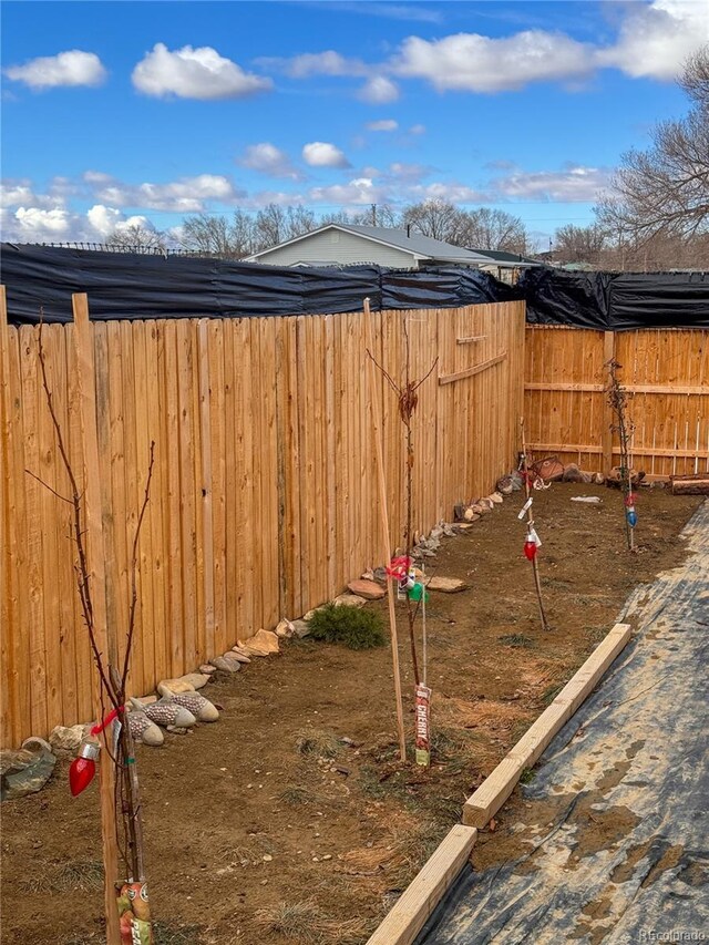 312 Ceratosaurus Cir, Dinosaur, CO 81610 - view of yard featuring a fenced backyard