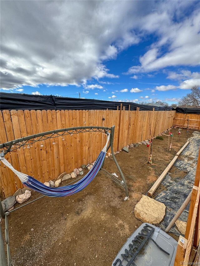 312 Ceratosaurus Cir, Dinosaur, CO 81610 - view of yard featuring a fenced backyard