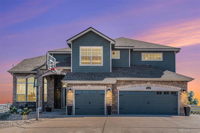 view of front of property with a garage