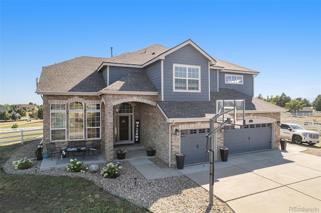 view of front of home with a garage