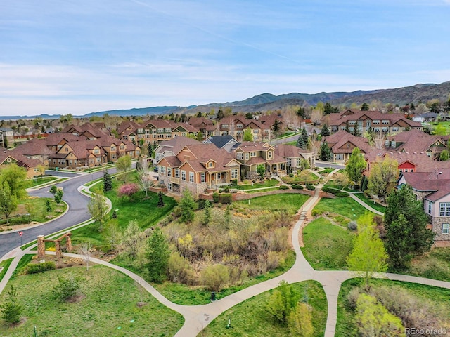 birds eye view of property with a residential view and a mountain view
