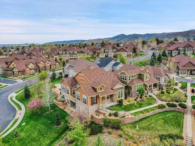 drone / aerial view featuring a mountain view and a residential view