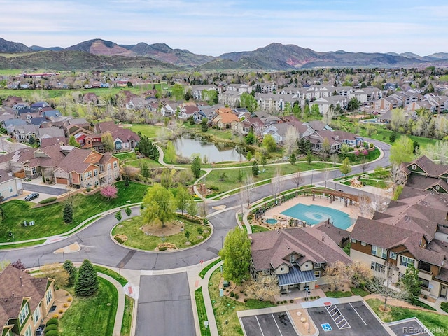 aerial view with a residential view and a water and mountain view