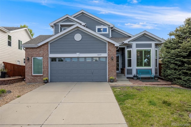 16839 Trail View Cir, Parker, CO 80134 - view of front of property featuring brick siding, driveway, and a garage