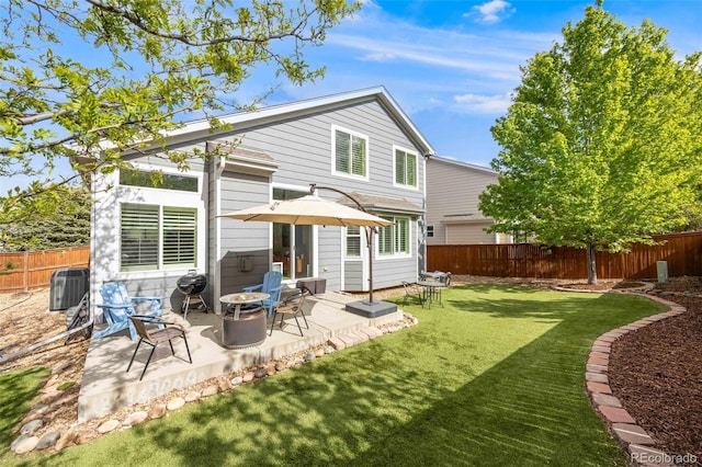 16839 Trail View Cir, Parker, CO 80134 - back of property featuring central AC and a patio area