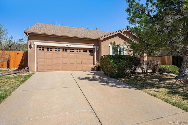 20137 E Prentice Pl, Centennial, CO 80015 - single story home with fence, stucco siding, driveway, and a garage