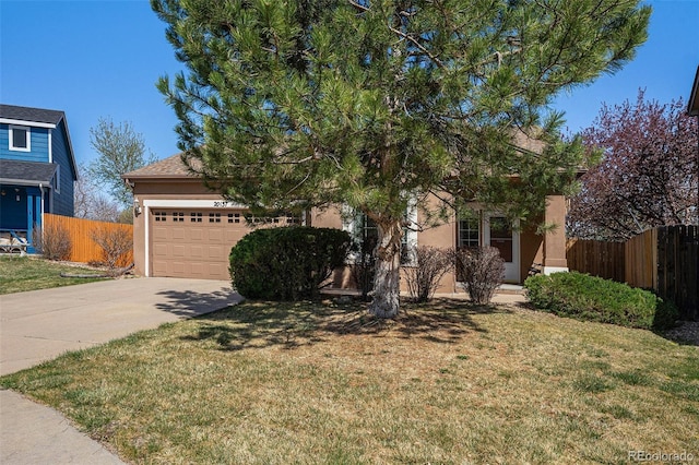20137 E Prentice Pl, Centennial, CO 80015 - view of property hidden behind natural elements with fence, stucco siding, driveway, and a garage