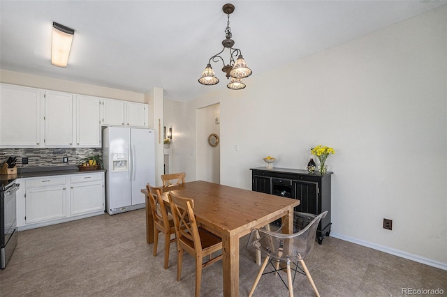 20137 E Prentice Pl, Centennial, CO 80015 - dining room with baseboards and a notable chandelier