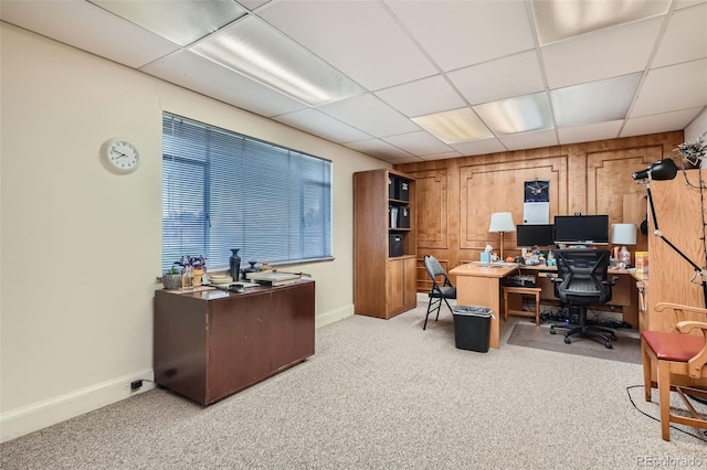 office area featuring light colored carpet and a drop ceiling