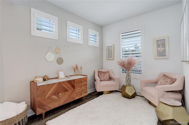 431 Courtfield Way, Castle Pines, CO 80108 - sitting room featuring wood finished floors