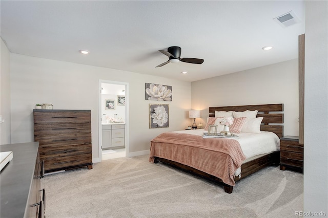 431 Courtfield Way, Castle Pines, CO 80108 - bedroom with light colored carpet, recessed lighting, ensuite bath, and a ceiling fan