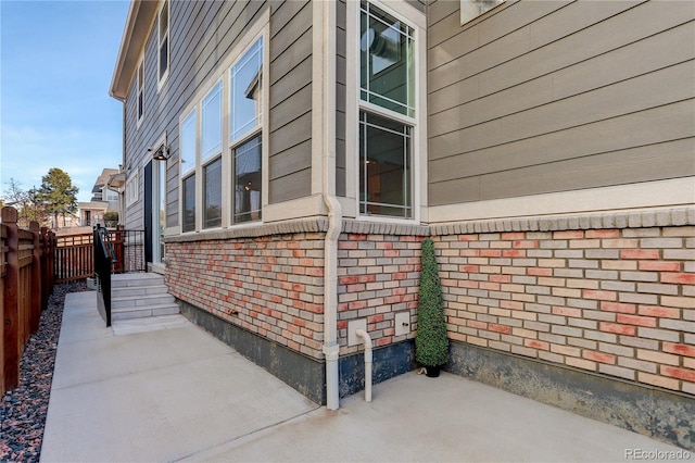 431 Courtfield Way, Castle Pines, CO 80108 - view of property exterior with brick siding