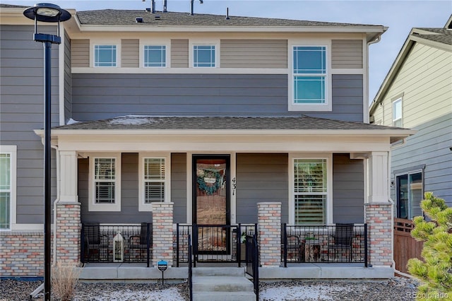431 Courtfield Way, Castle Pines, CO 80108 - view of front of property with covered porch