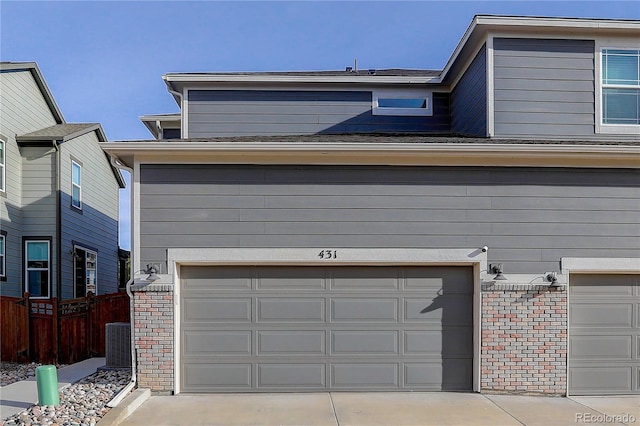 431 Courtfield Way, Castle Pines, CO 80108 - garage featuring concrete driveway