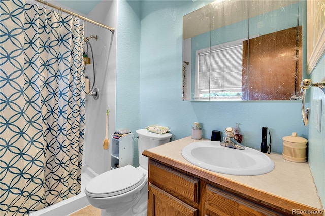 full bath featuring curtained shower, vanity, toilet, and tile patterned floors